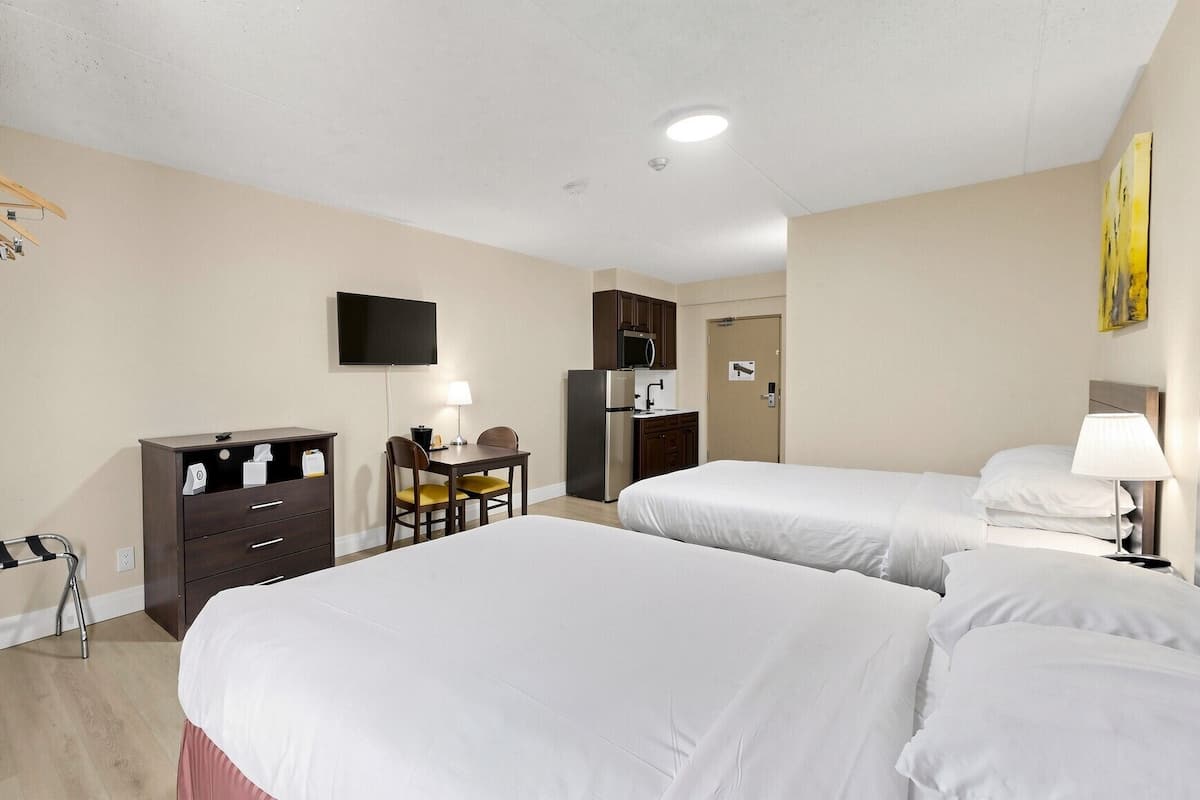 Standard Room, 2 Queen Beds, Ground Floor | Premium bedding, desk, blackout drapes, free WiFi