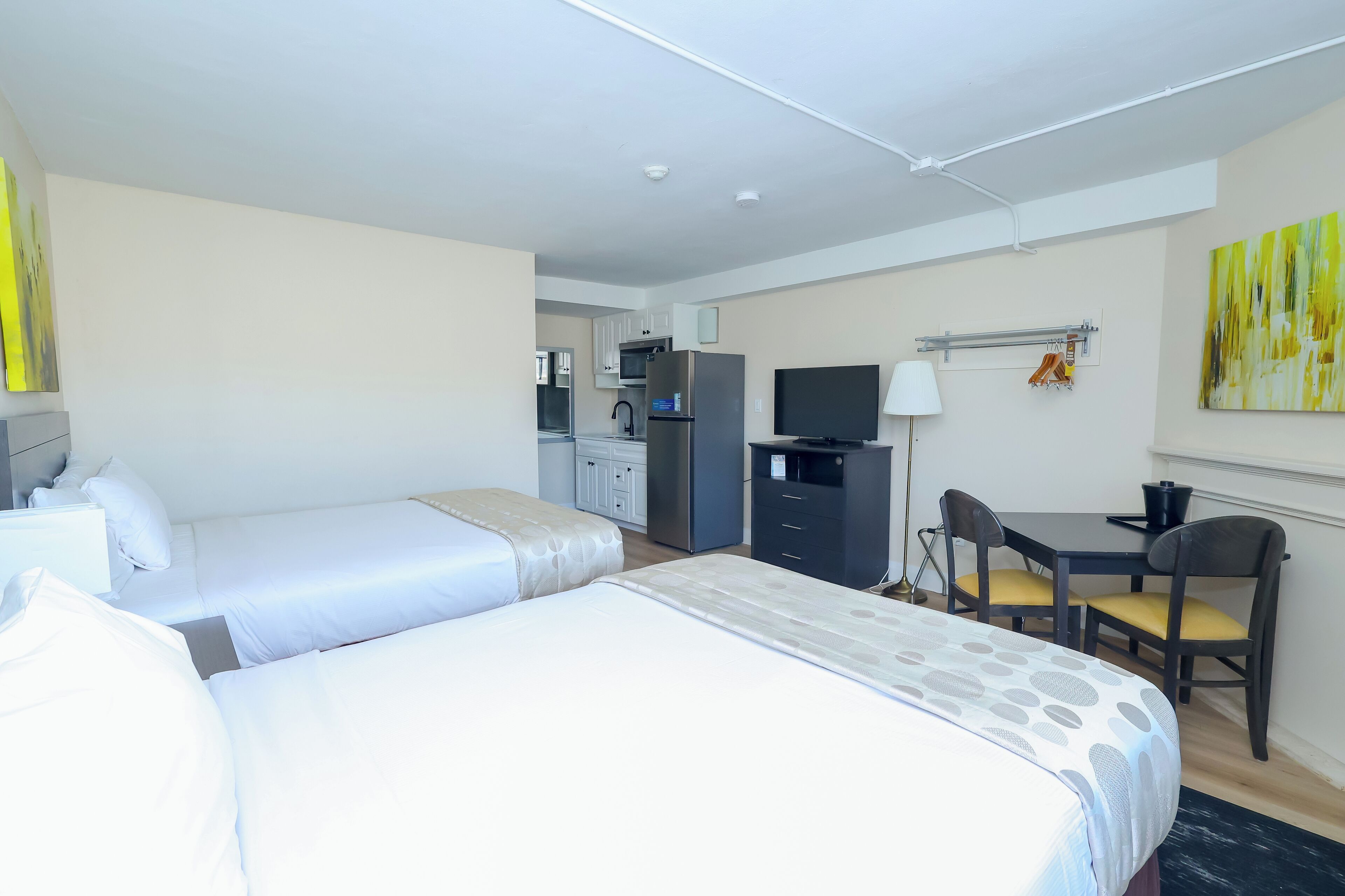 standard room, 2 queen beds, ground floor (exterior access only) | premium bedding, desk, blackout curtains, free wifi