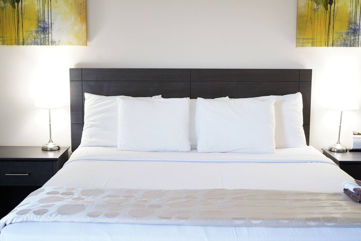 premium bedding, desk, blackout curtains, free wifi