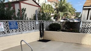 A small, shallow pool with a depth marker of 3 feet and a no diving sign. - Ocean Villas Beach Resort (Myrtle Beach)