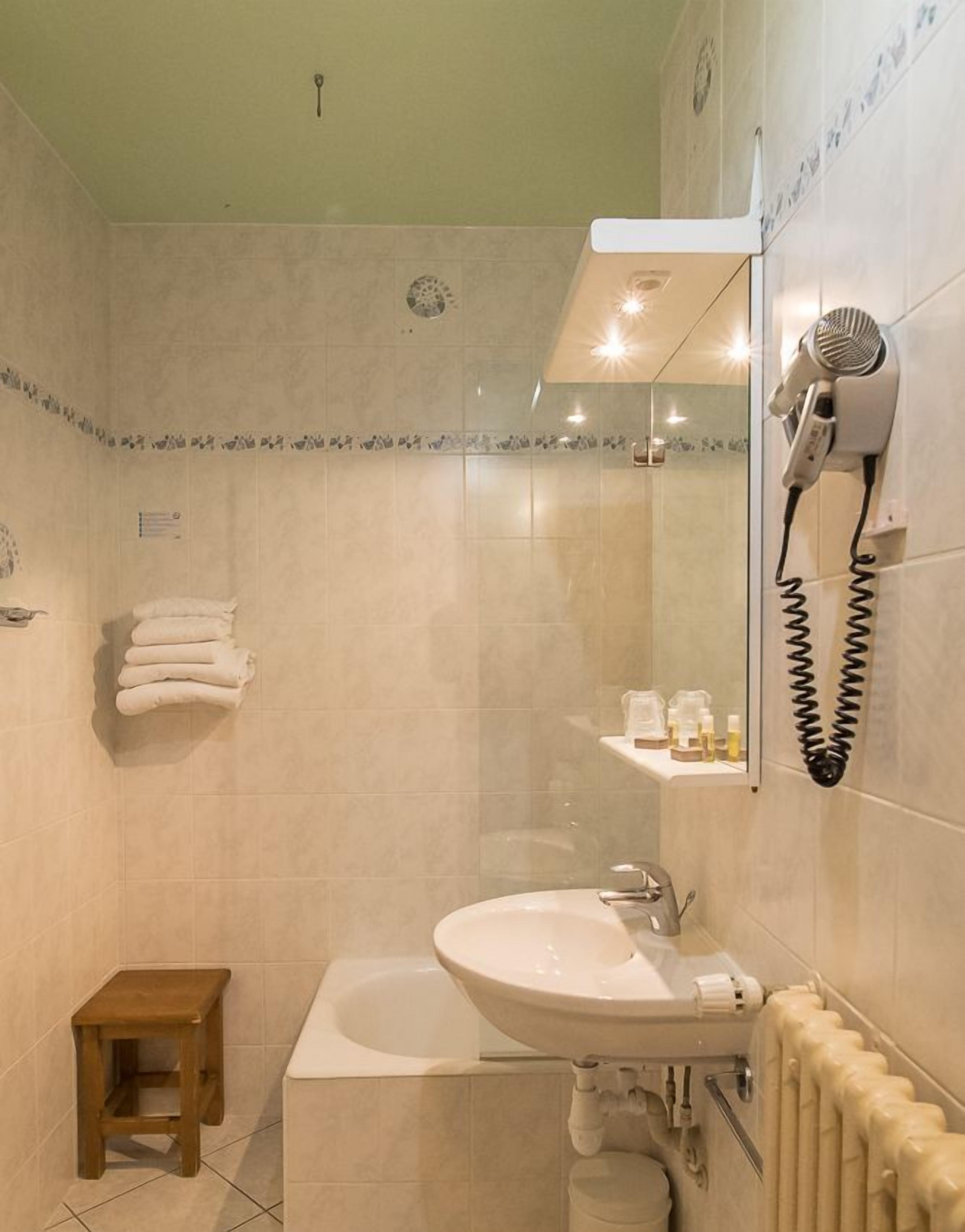 superior double room | bathroom | free toiletries, hair dryer, towels