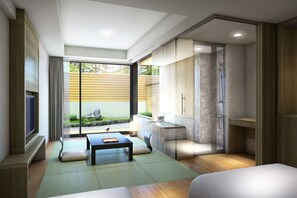 Luxe beddengoed, donsdekens, een kluis op de kamer, een bureau