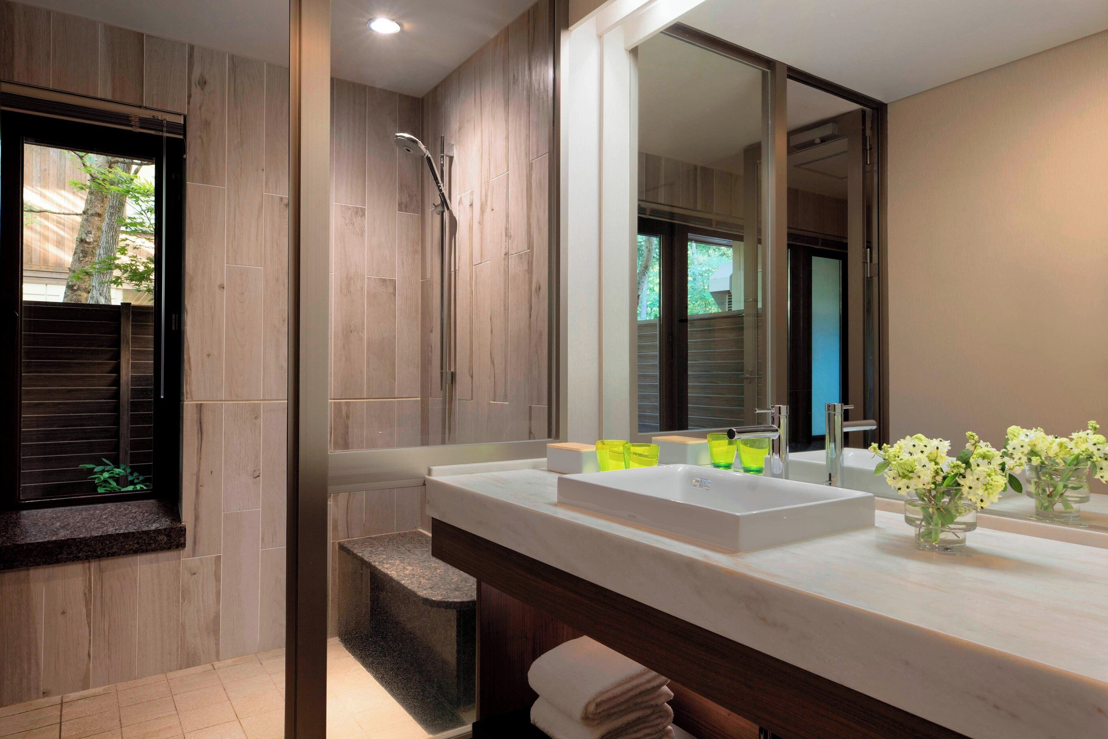 cottage (dog friendly, hot-spring) | bathroom | combined shower/bathtub, free toiletries, hair dryer, slippers