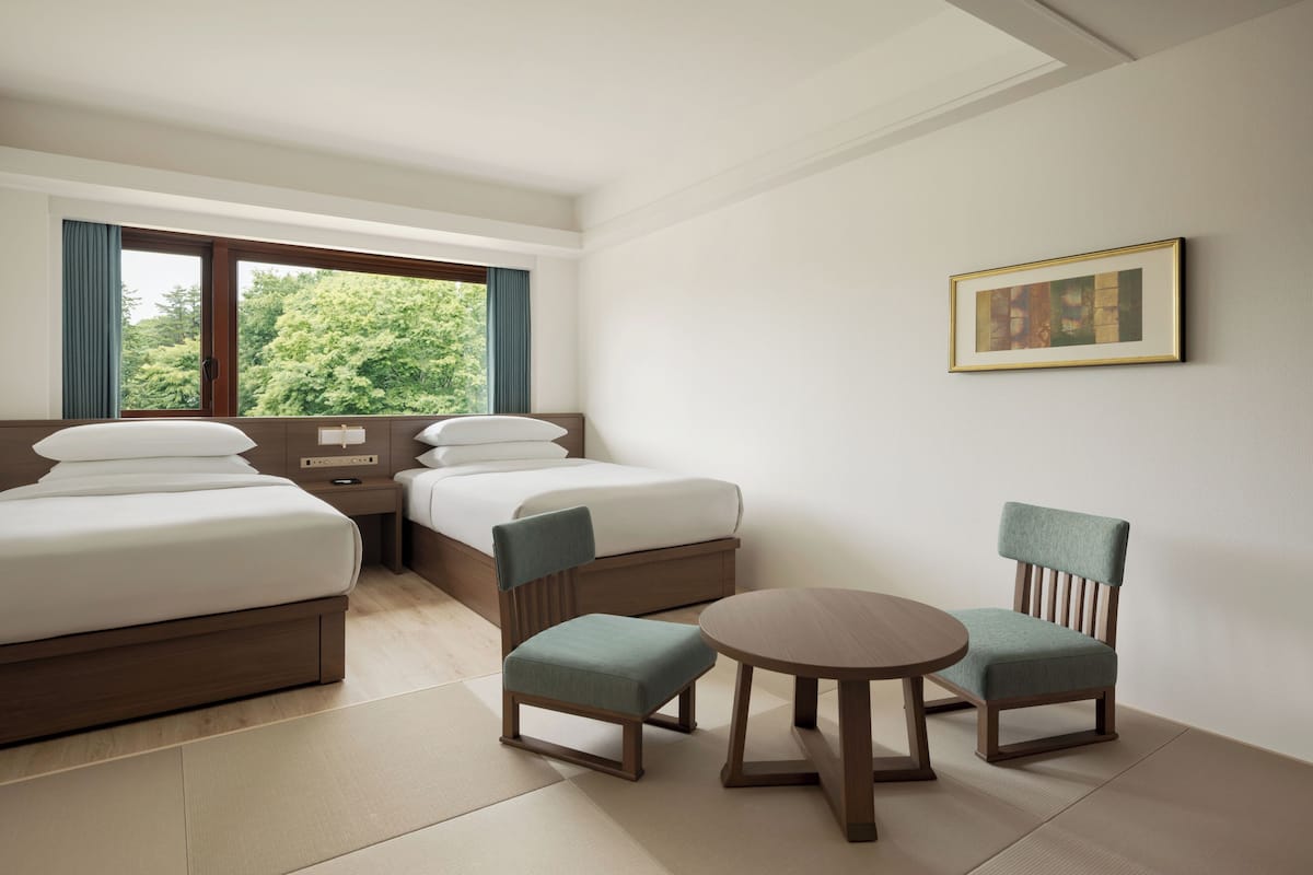 Premium bedding, down comforters, in-room safe, desk