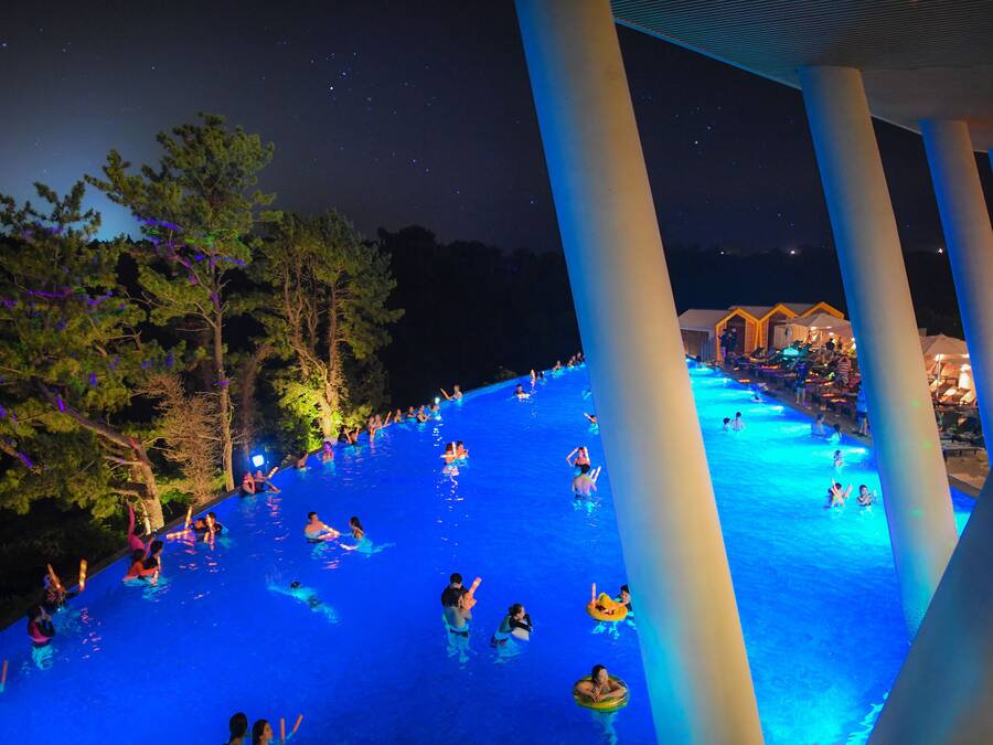 Outdoor pool, open 9:00 AM to 10:00 PM, pool loungers