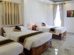 Een minibar, extra bedden, gratis wifi