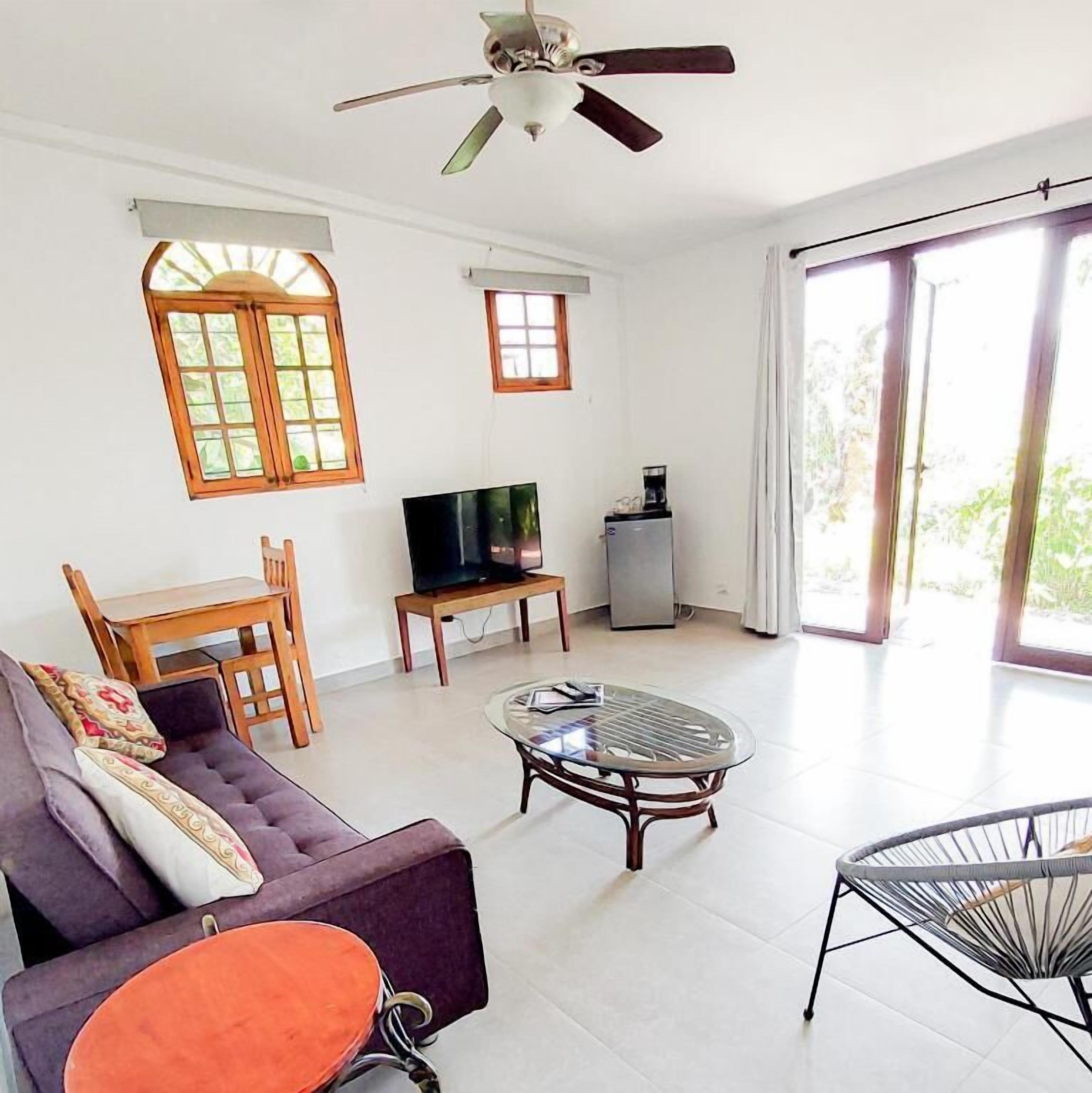 family suite, 2 bedrooms | living area | 32-inch flat-screen tv with cable channels, tv