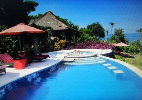 Outdoor pool, pool umbrellas, sun loungers