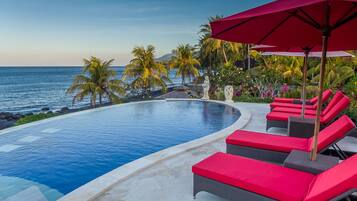 Outdoor pool, pool umbrellas, sun loungers