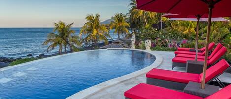 Outdoor pool, pool umbrellas, sun loungers