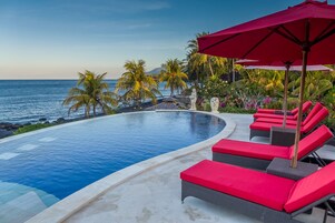 Outdoor pool, pool umbrellas, sun loungers