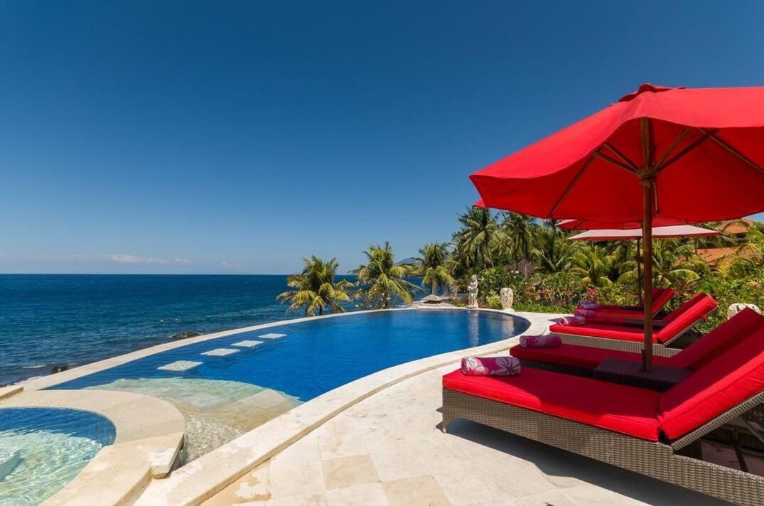 Outdoor pool, pool umbrellas, pool loungers