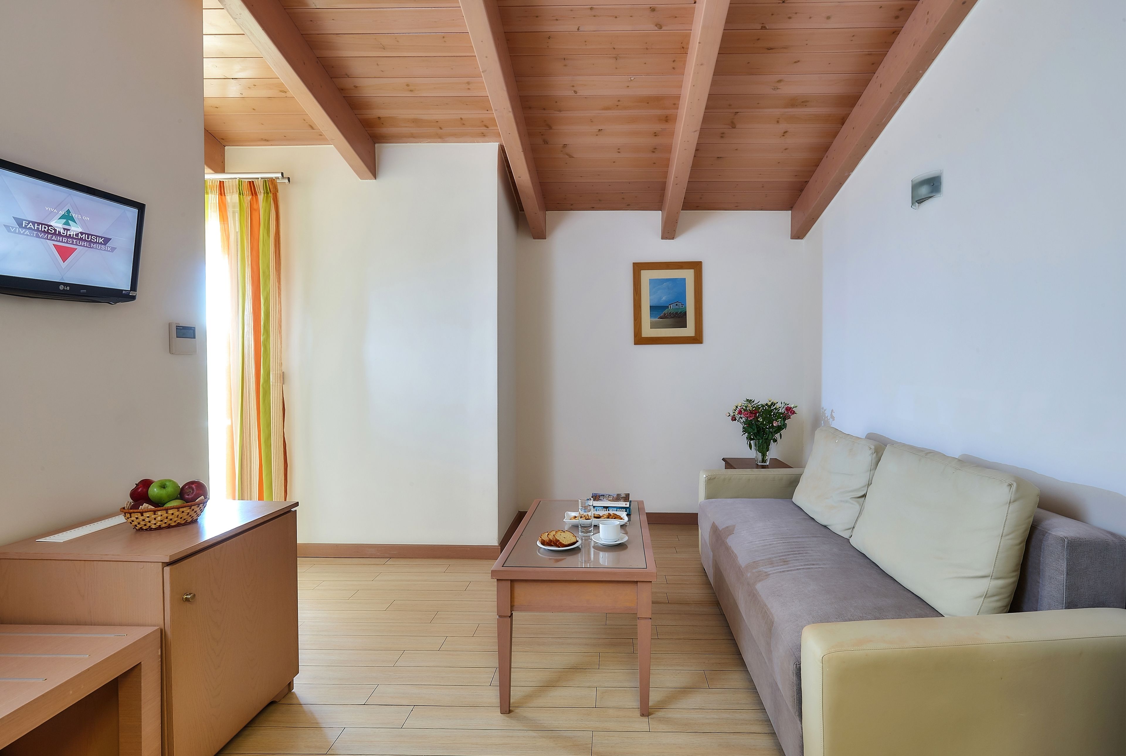 junior suite, pool view | living area | 21-inch plasma tv with cable channels, tv