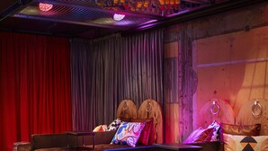 A theater with a stage, curtains, and seating. - Generator Stockholm (Stockholm)