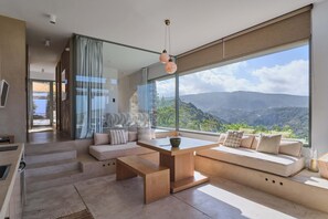 Valley Retreat with courtyard Hot Tub & Sea Views | Living area | 32-inch Smart TV with digital channels, Netflix, streaming services - Hidden Retreats Kythera (Kithira)