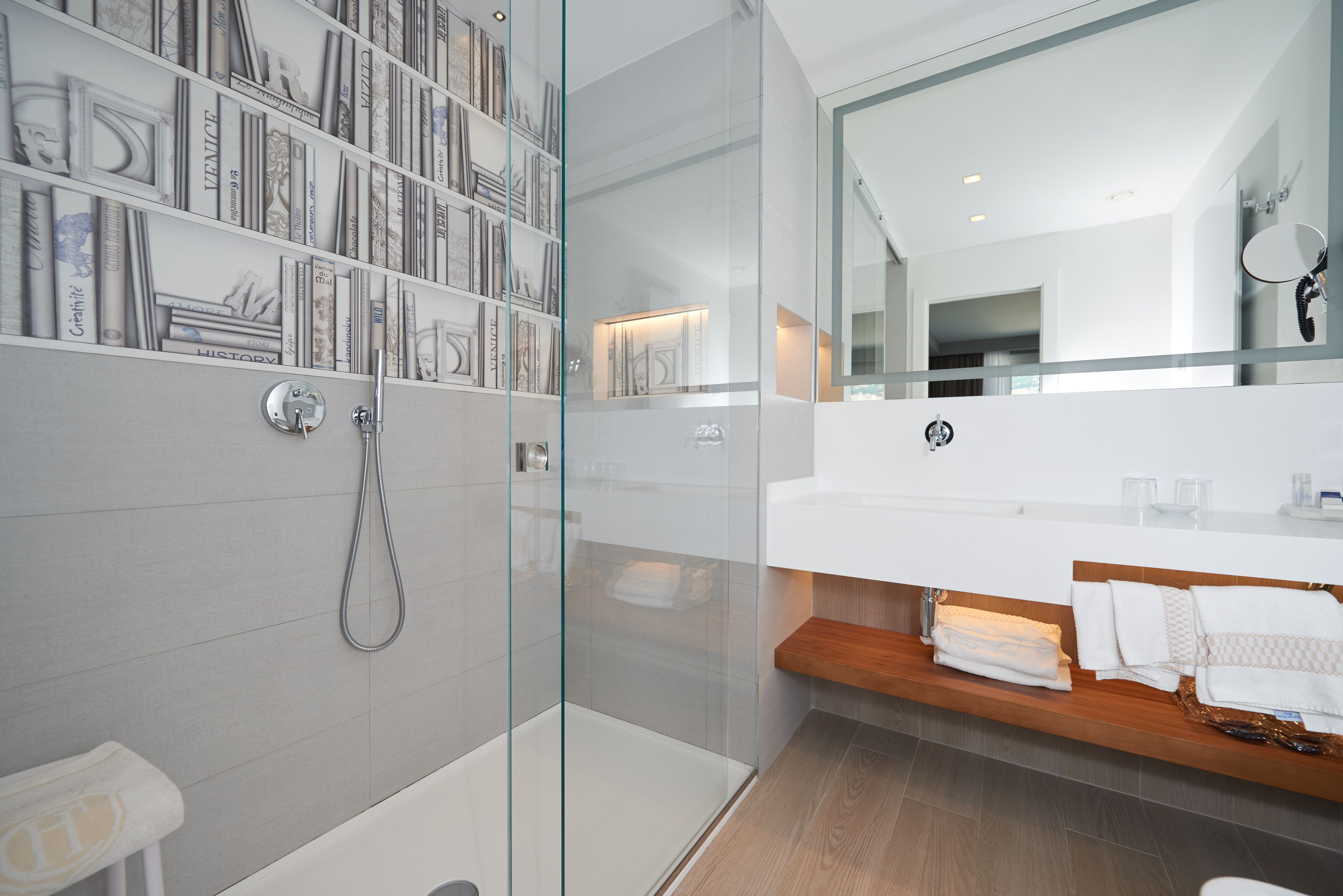 suite, lake view | bathroom | shower, free toiletries, hair dryer, slippers