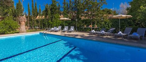 Outdoor pool, open 8:30 AM to 9:30 PM, pool umbrellas, pool loungers