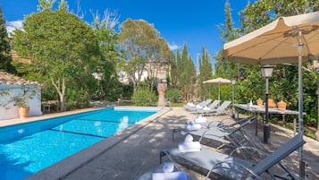 Outdoor pool, open 8:30 AM to 9:30 PM, pool umbrellas, pool loungers