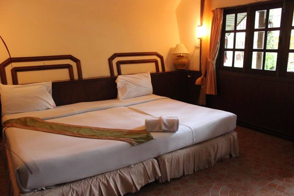 Superior Cottage Room | Minibar, caja fuerte, escritorio y cortinas opacas