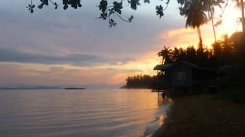 On the beach, kayaking
