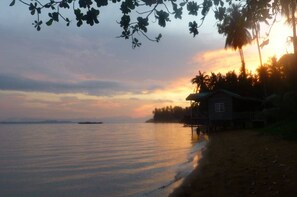 On the beach, kayaking