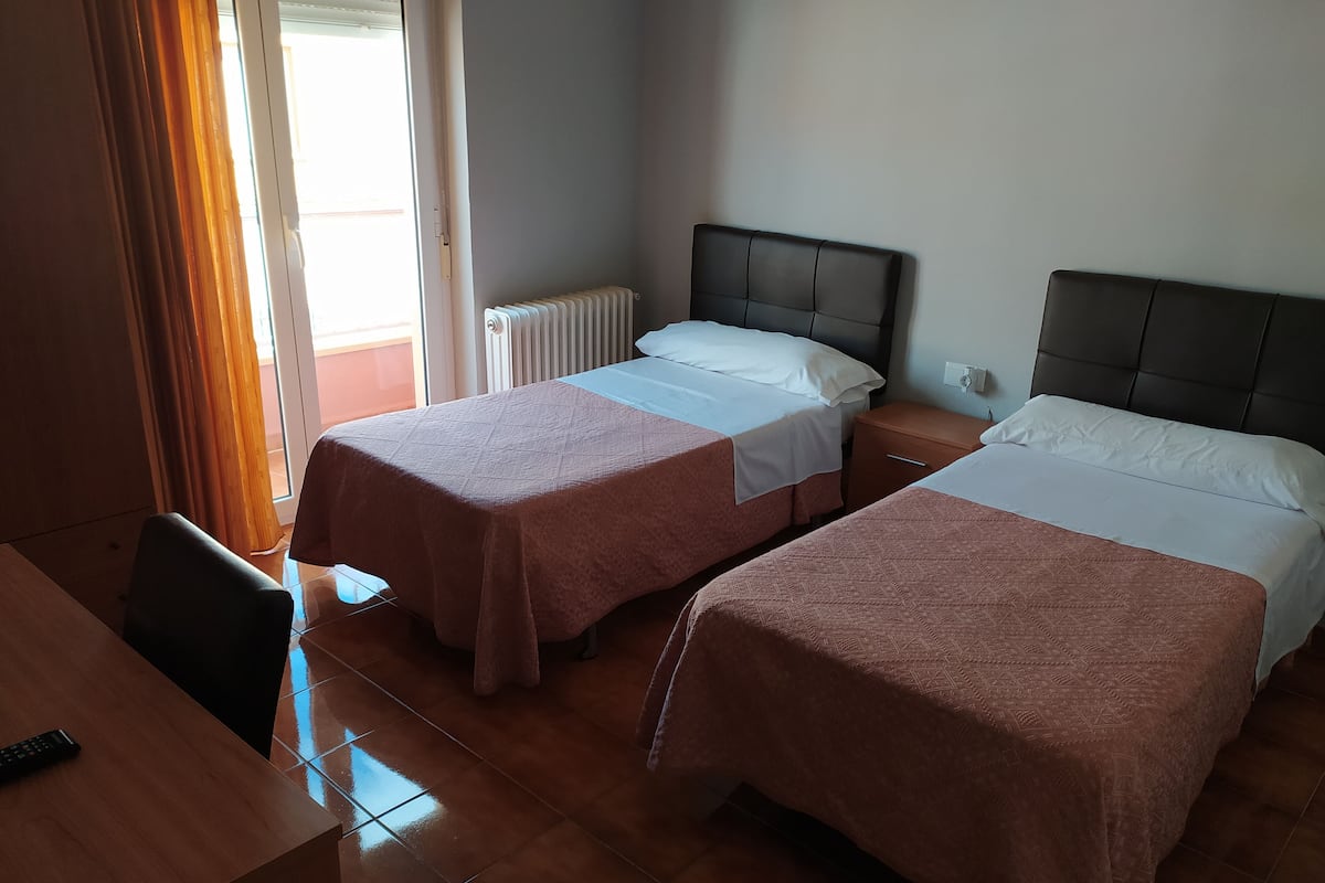 Double or Twin Room | Desk, blackout drapes, rollaway beds, free WiFi