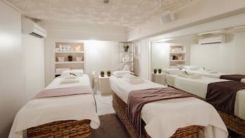 Massages aux pierres chaudes, massages des tissus profonds, massages