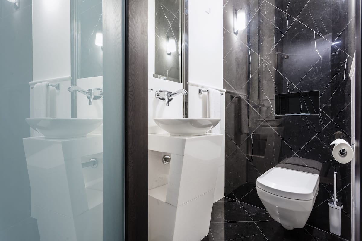 deluxe apartment, 1 bedroom | bathroom | designer toiletries, hair dryer, bathrobes, slippers