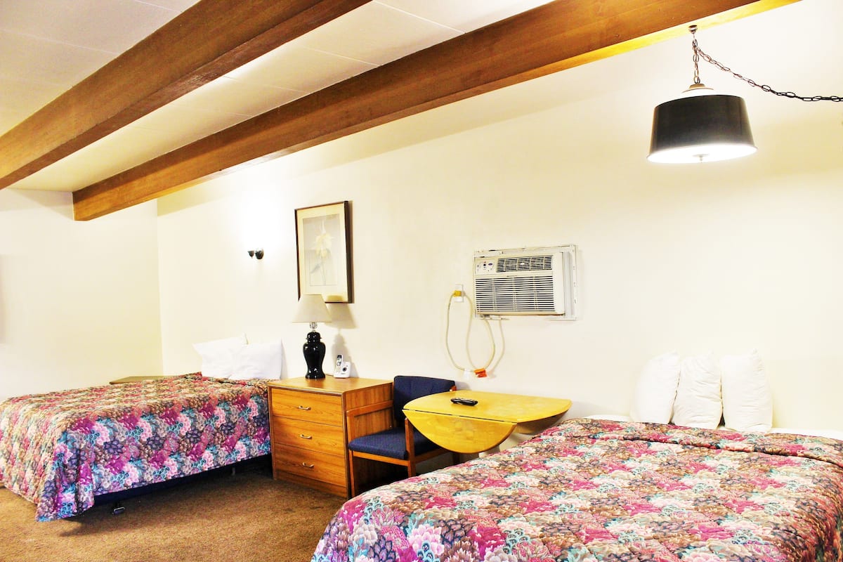 Family Room, 2 Queen Beds | Desk, blackout drapes, WiFi (free), individually decorated