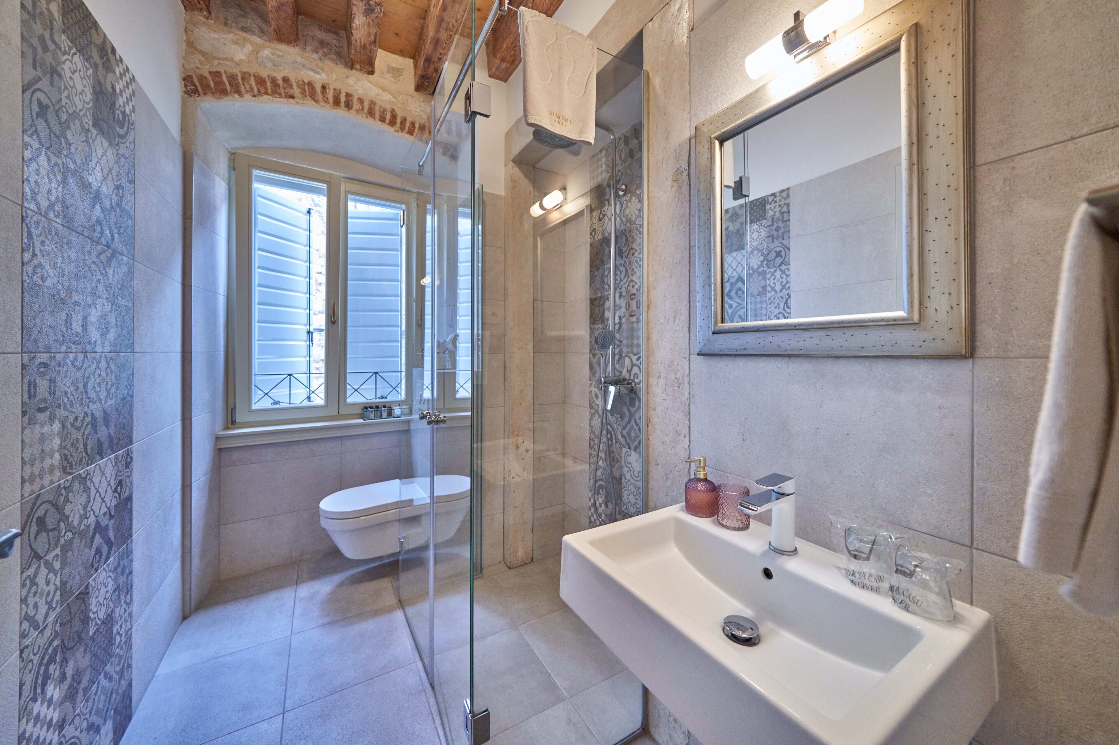 deluxe double or twin room - annex | bathroom | free toiletries, hair dryer, bathrobes, slippers