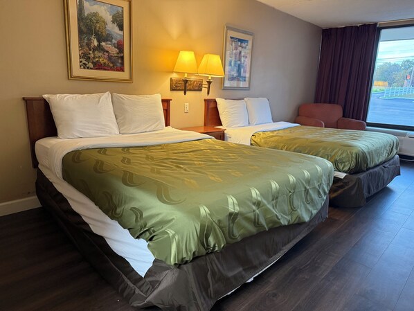 Premium bedding, desk, laptop workspace, iron/ironing board