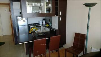 Fridge, microwave, stovetop, cookware/dishes/utensils