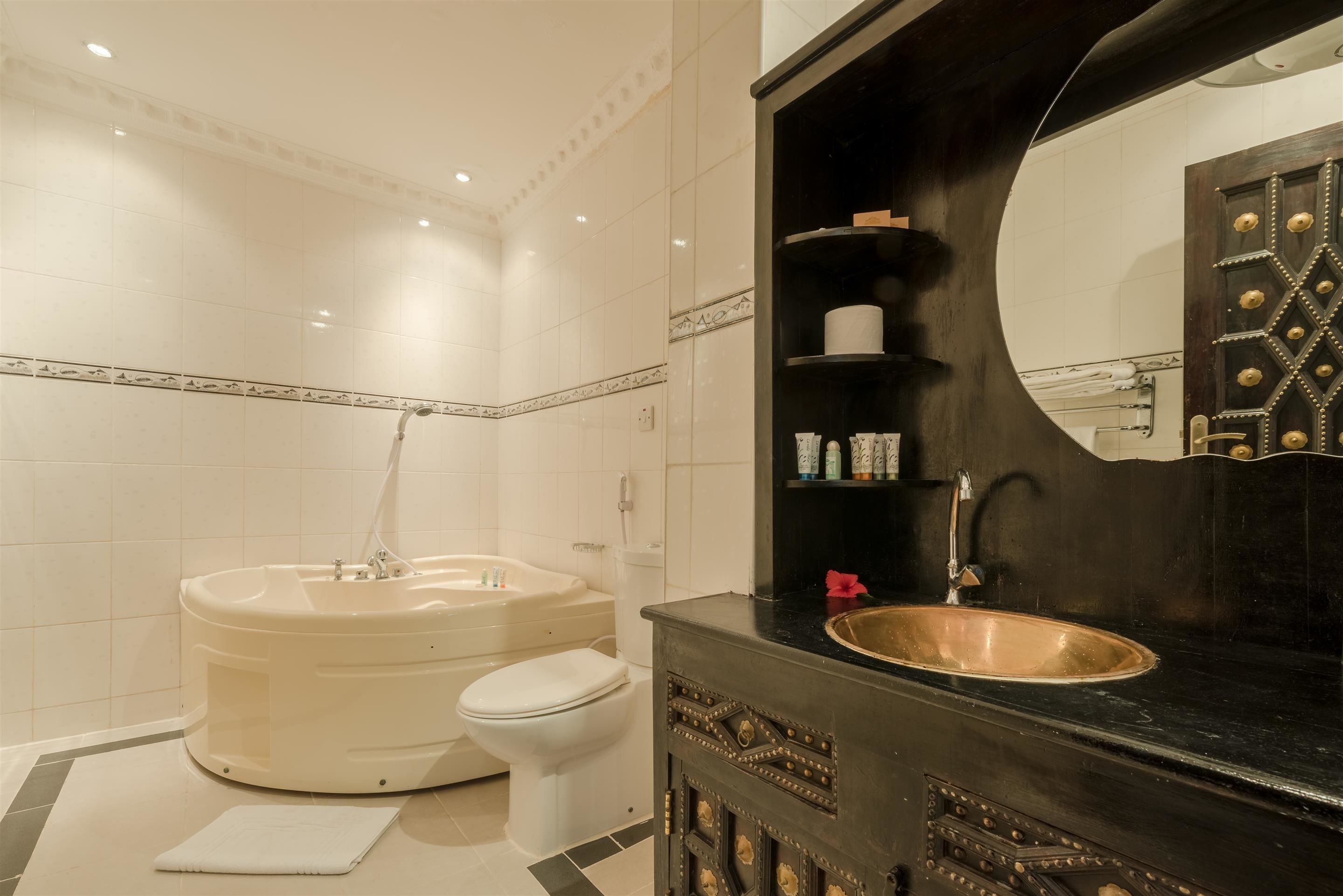 eco-friendly toiletries, hair dryer, slippers, towels