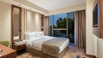 Premium bedding, free minibar items, in-room safe, desk