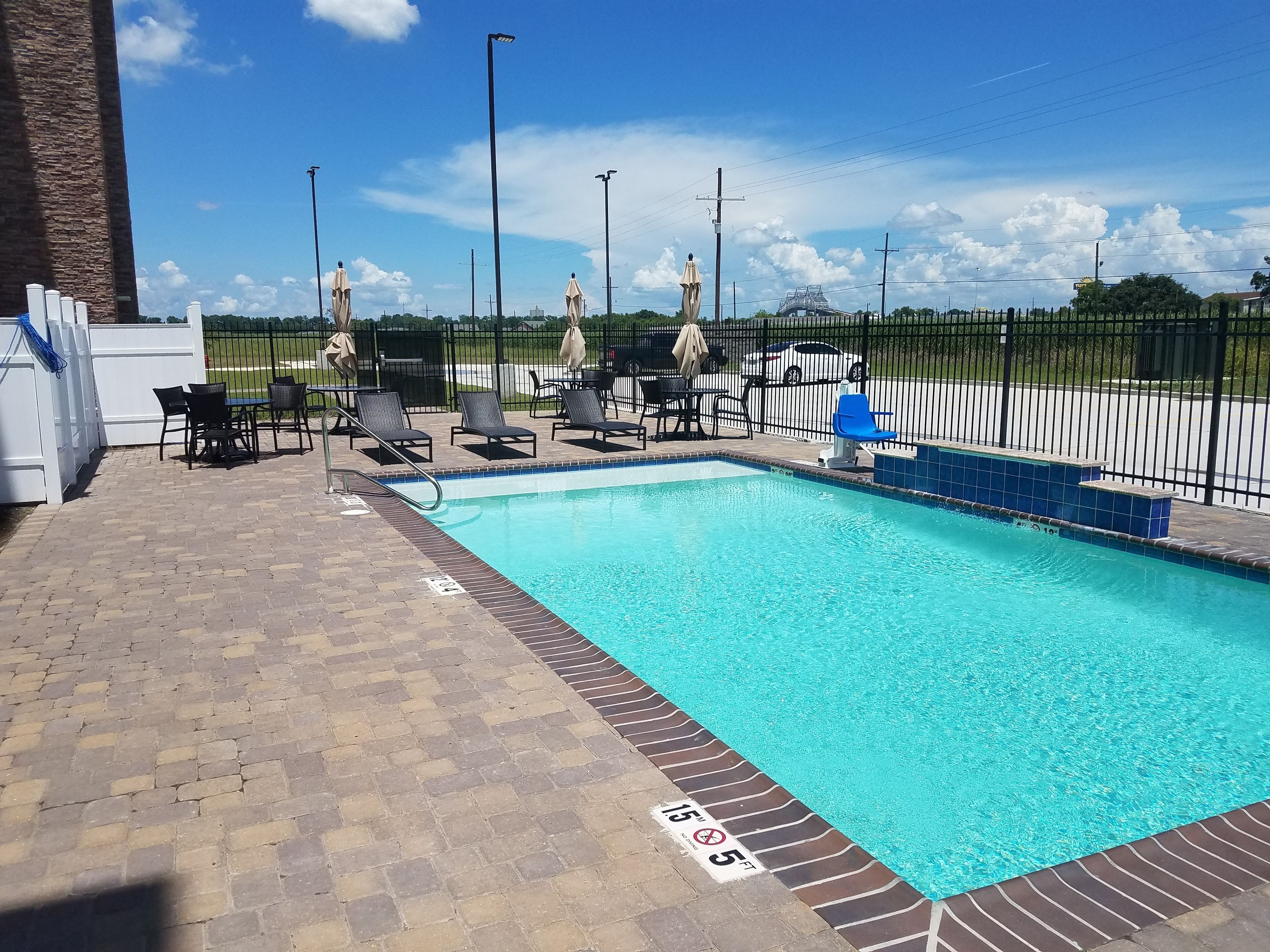 outdoor pool, open 9 am to 9 pm, pool loungers