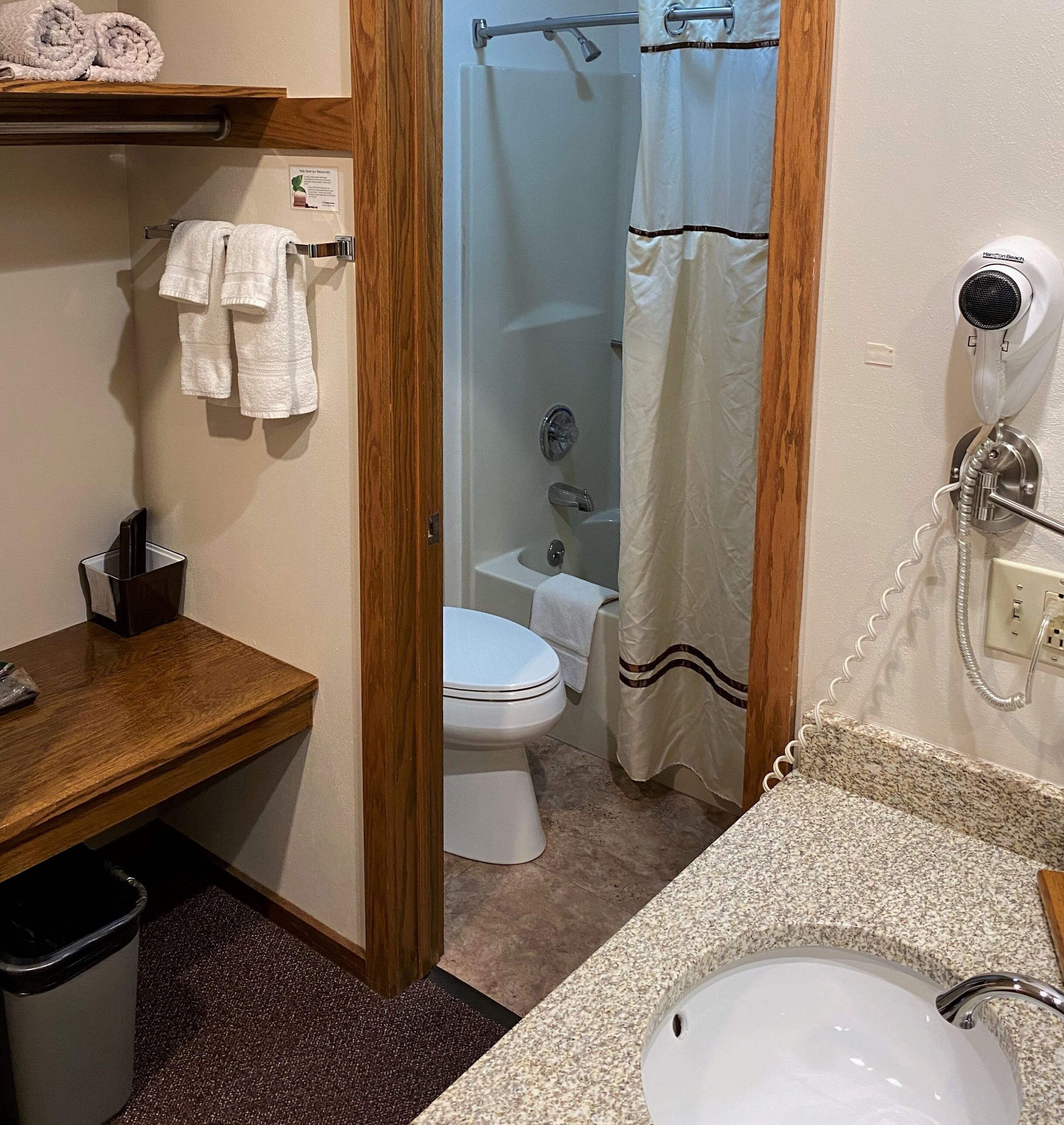 combined shower/bathtub, free toiletries, hair dryer, towels