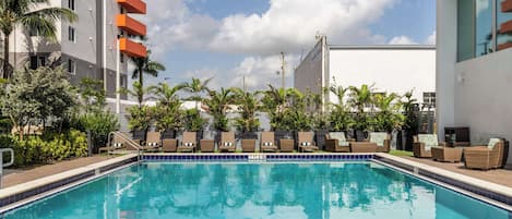 Outdoor pool, open 8 AM to 9 PM, pool umbrellas, sun loungers