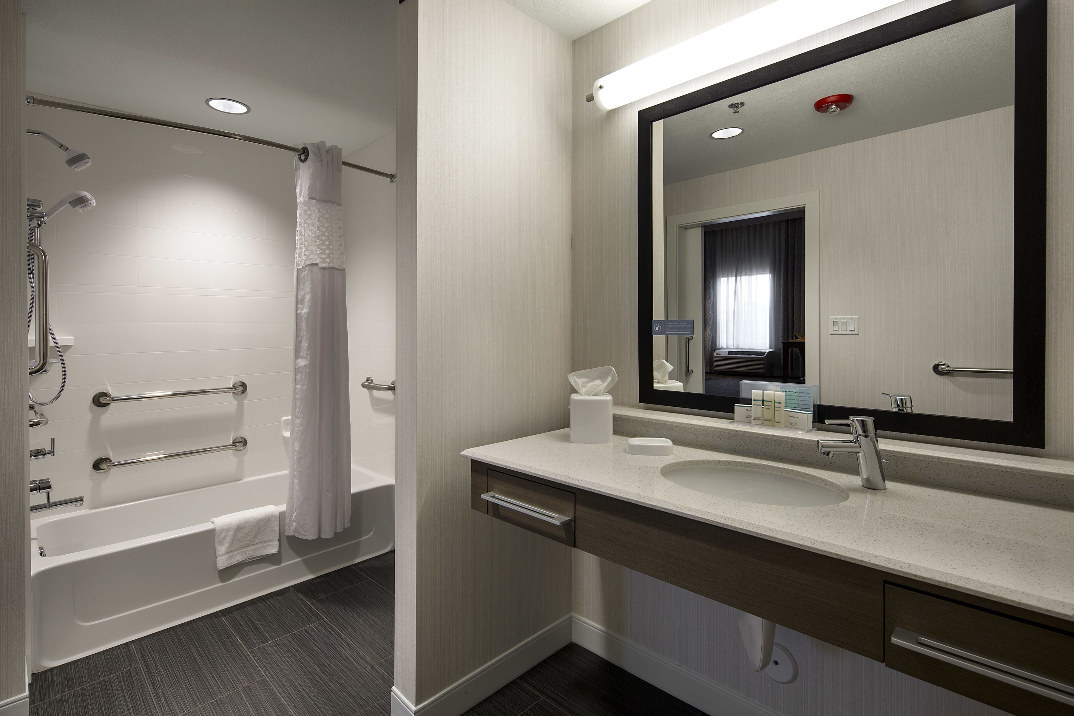 combined shower/bathtub, free toiletries, hair dryer, towels