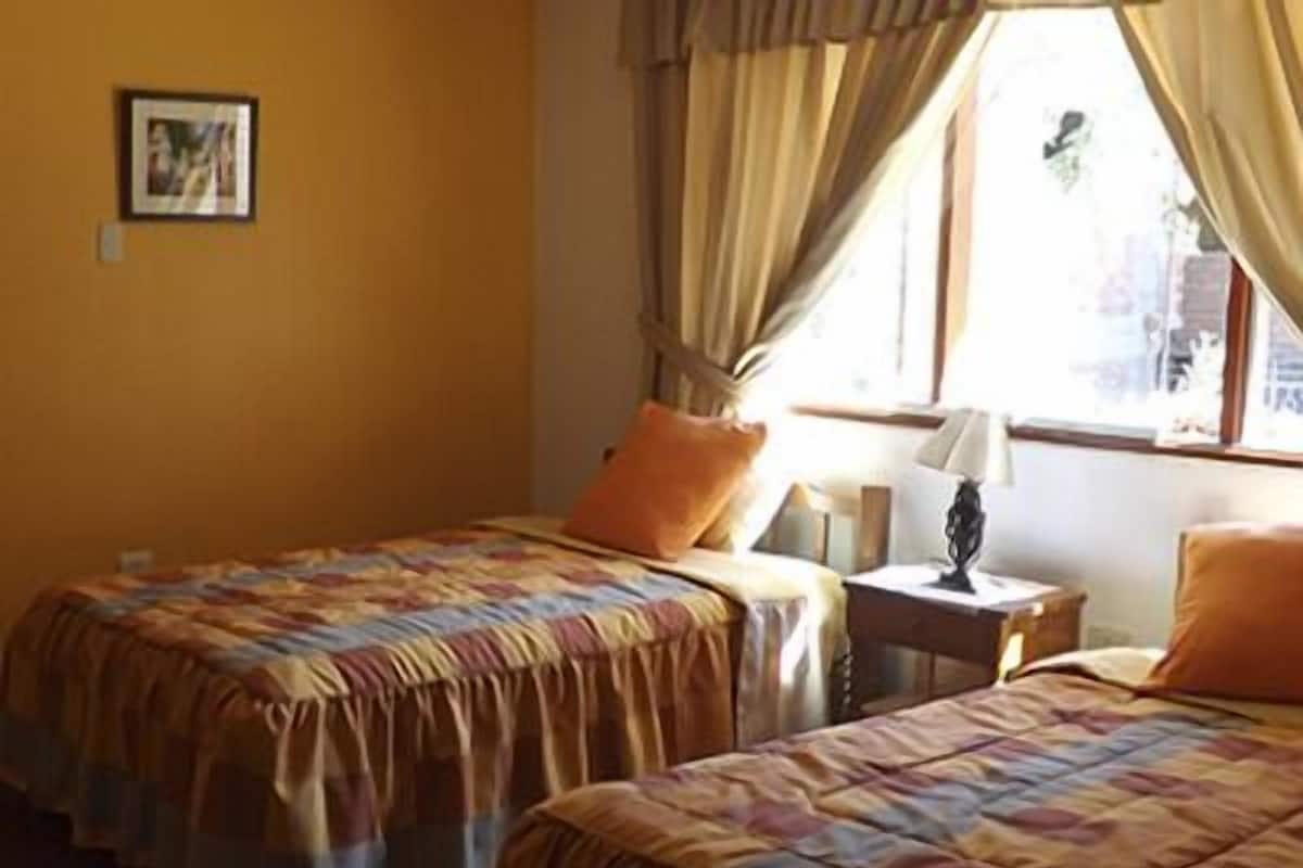 Twin Room, Private Bathroom | In-room safe, iron/ironing board (on request), rollaway beds (free)