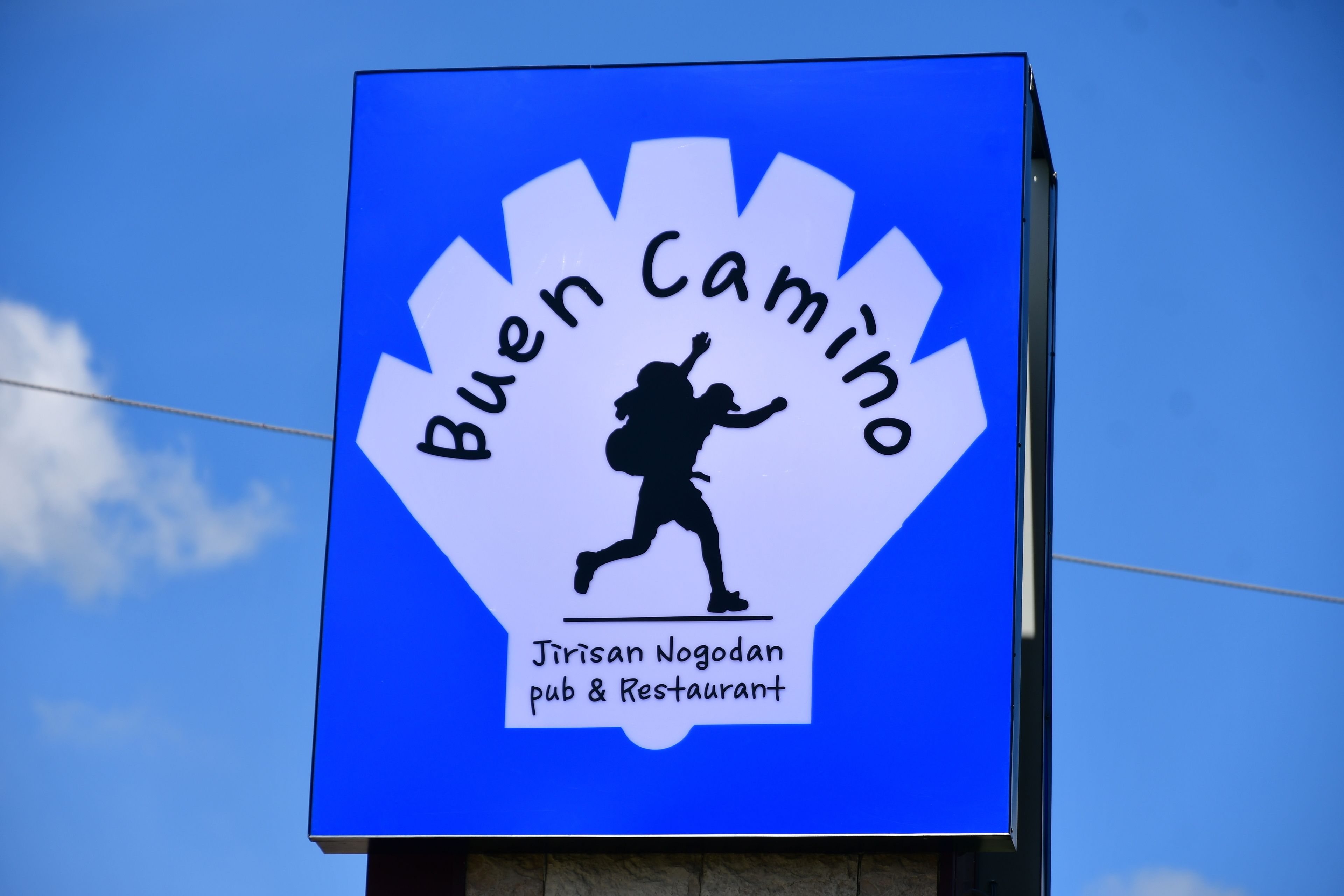 A sign for Buen Camino pub & restaurant.
