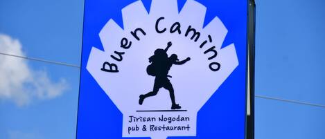 A sign for Buen Camino pub & restaurant.