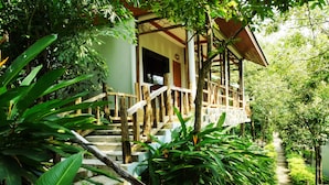 A wooden staircase leading to a building surrounded by lush greenery. - Chai Chet Resort Koh Chang (Ko Chang)