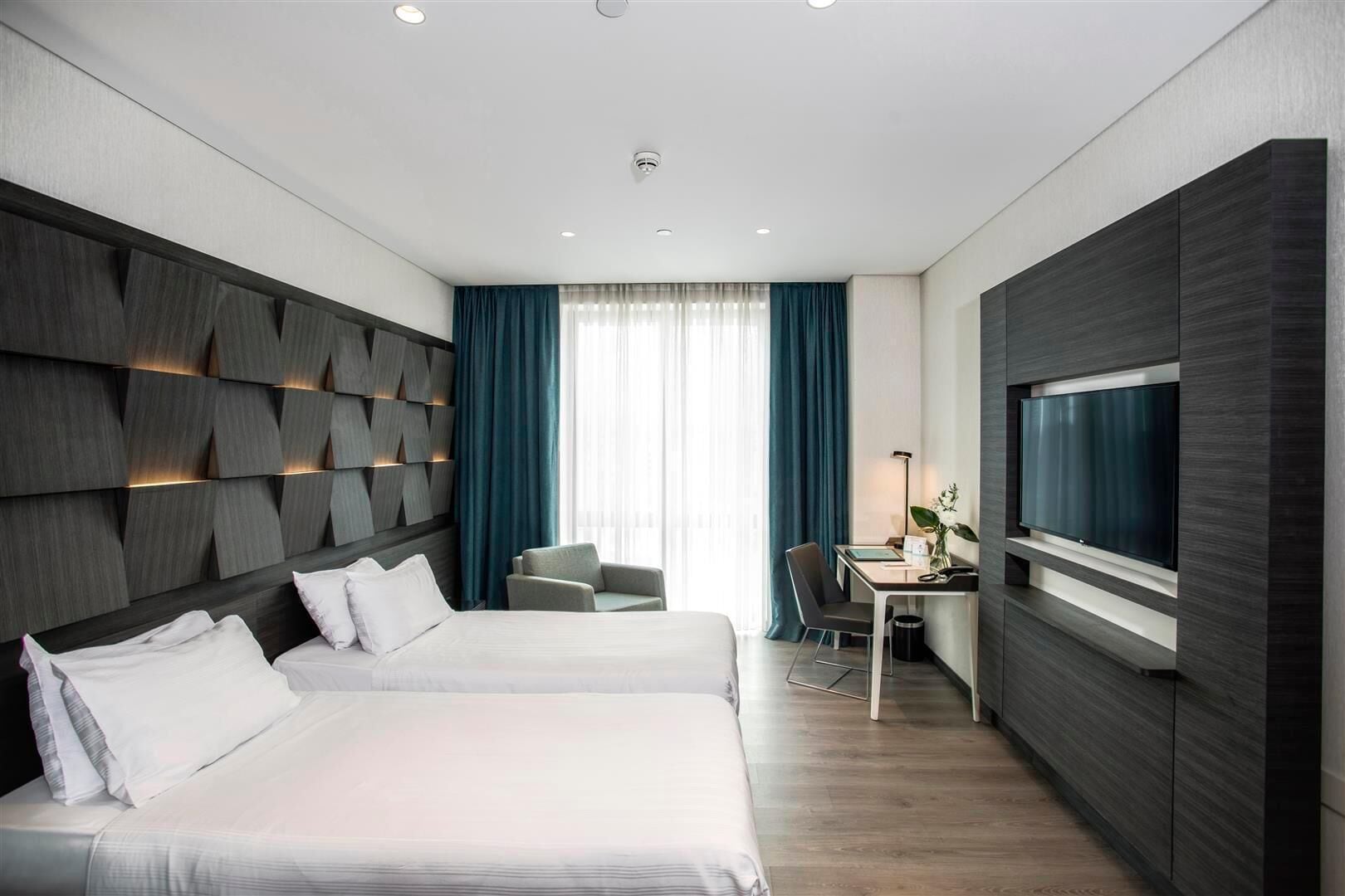 Premium bedding, free minibar, in-room safe, desk