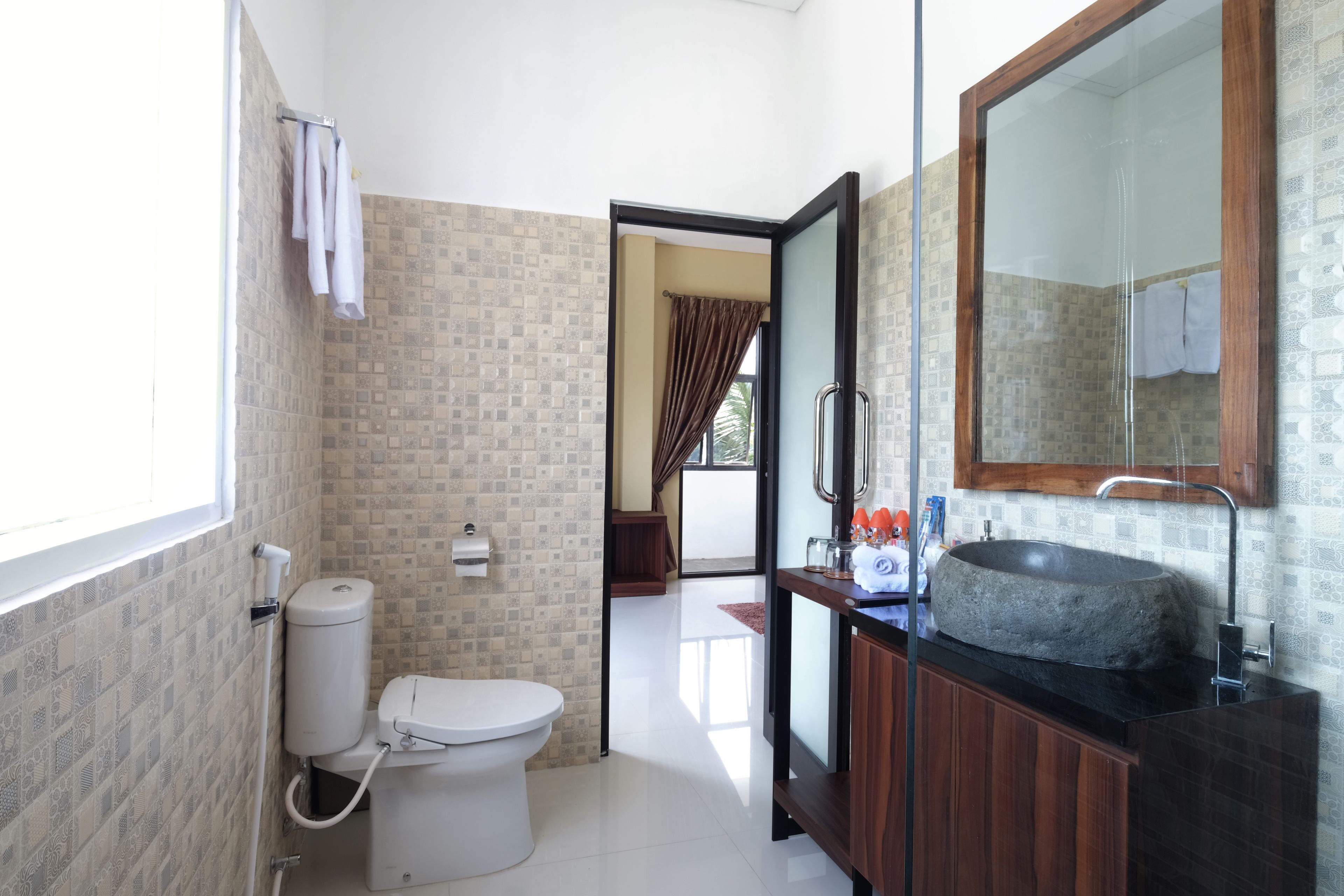 family room | bathroom | shower, free toiletries, hair dryer, dressing gowns