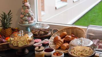 Daily buffet breakfast (EUR 15 per person)