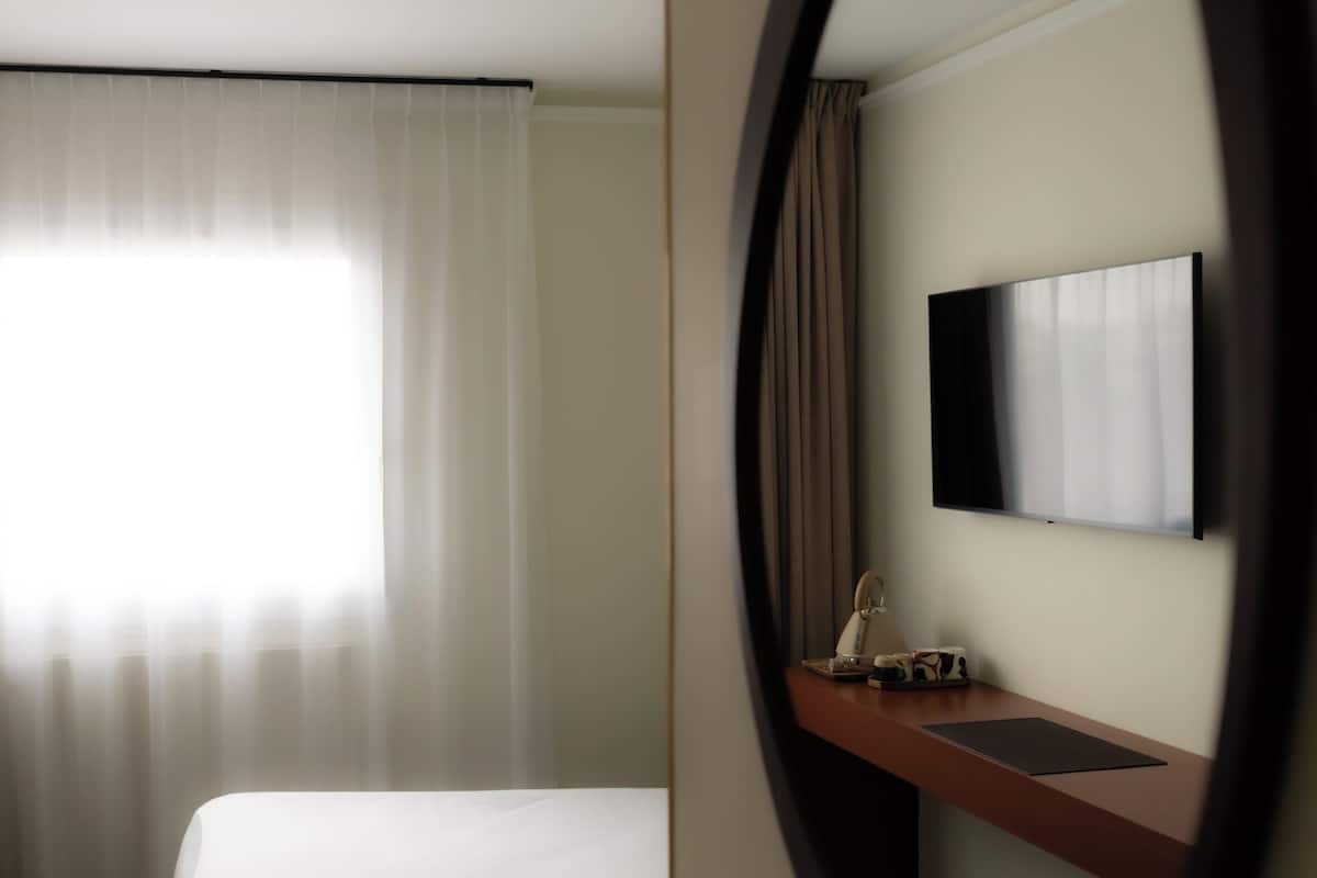 In-room safe, blackout drapes, soundproofing, iron/ironing board