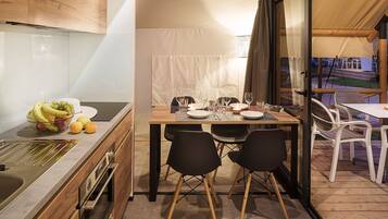 Luxury Tent | Private kitchen | Stovetop, highchair, cookware/dishes/utensils