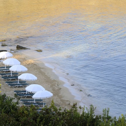Private beach, sun loungers, beach umbrellas, beach towels