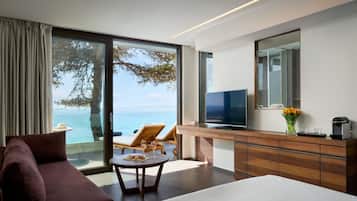 Junior Suite, Jetted Tub, Sea Facing (Seafront) | Minibar, in-room safe, desk, laptop workspace