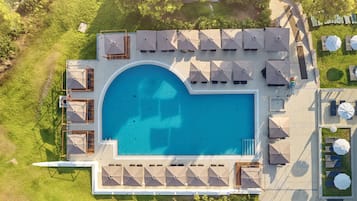 Outdoor pool, open 9 AM to 7 PM, pool cabanas (surcharge)